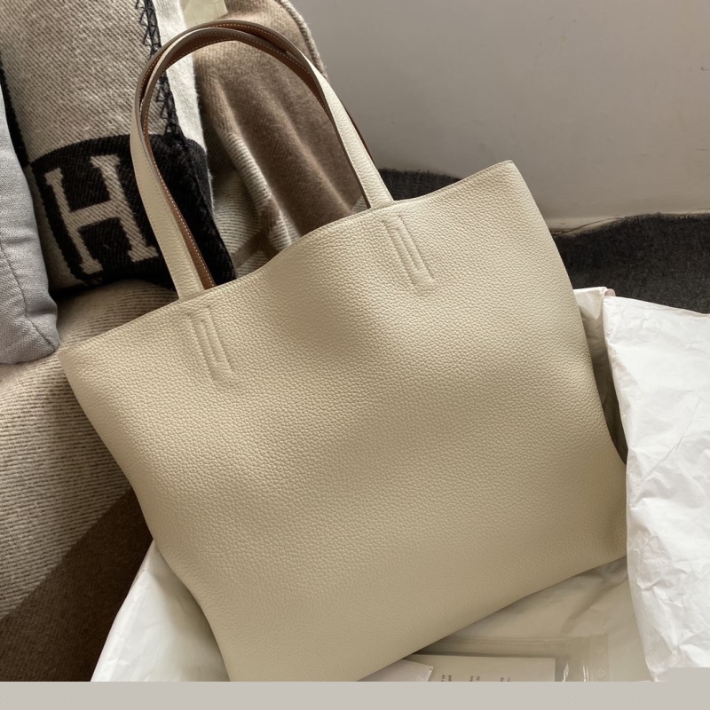 H**mes shopping bags